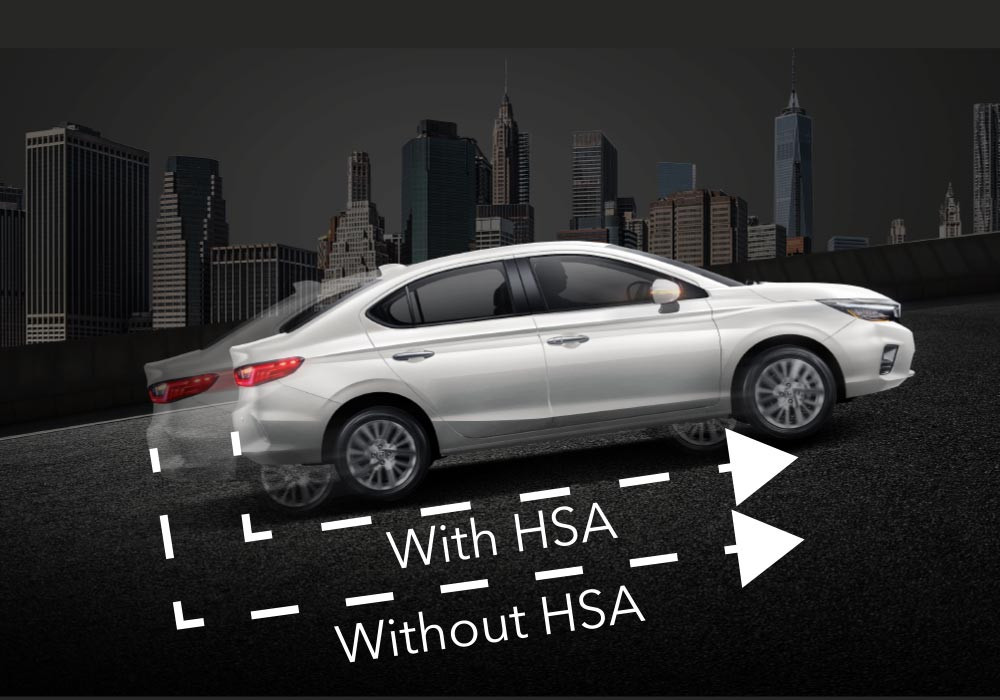 Hill Start Assist (HSA)
Hill Start Assist berfungsi untuk mencegah kendaraan bergerak mundur saat pengemudi memindahkan kaki dari pedal rem ke pedal gas saat berhenti di jalan menanjak.
Sistem ini otomatis berfungsi saat sistem mendeteksi kendaraan berhenti mengahadap jalan menanjak, atau dalam posisi gigi mundur saat kendaraan menghadap jalan menurun.